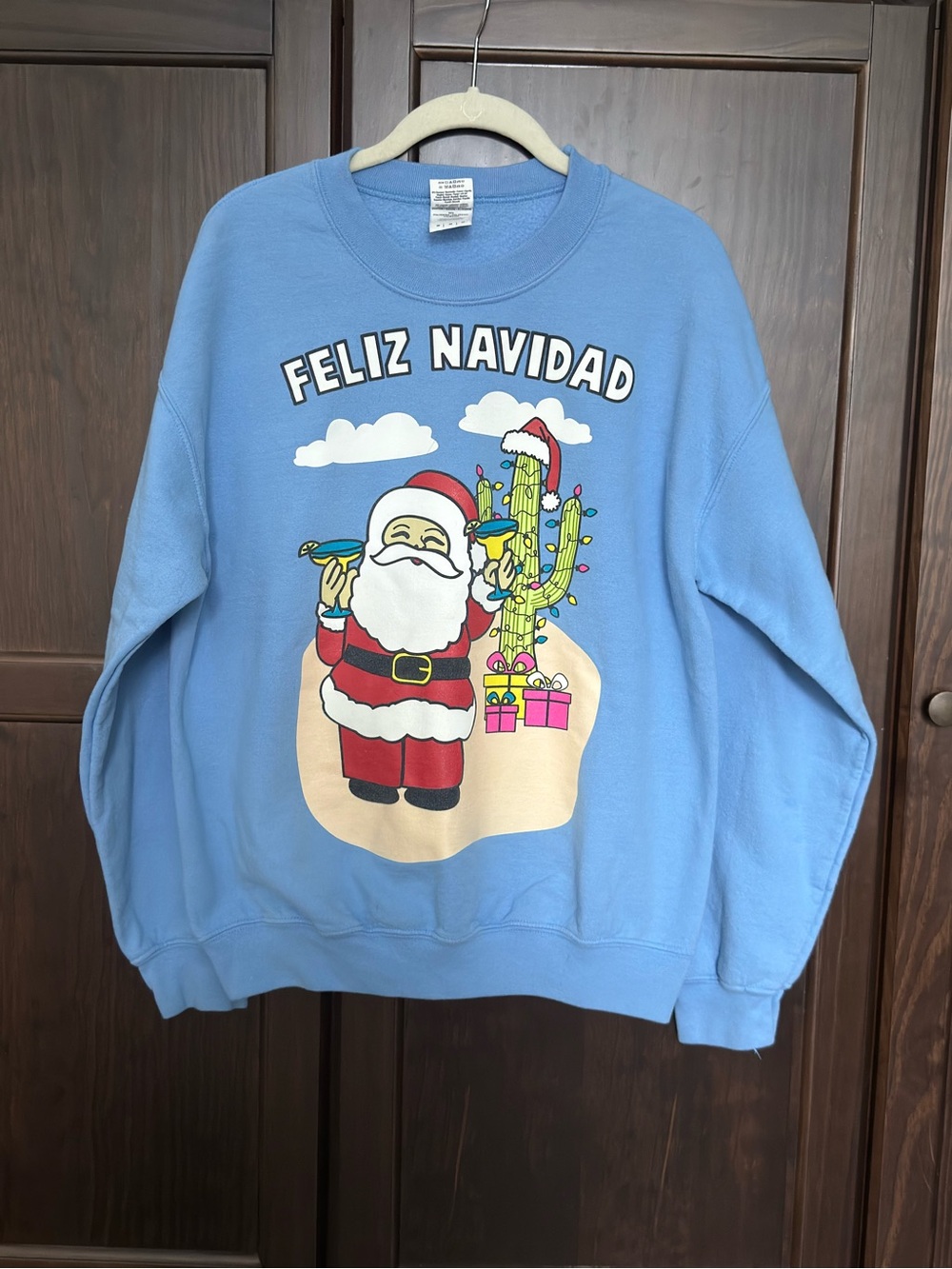 Gildan Light Blue 'Feliz Navidad' Crewneck with Santa Cactus Graphic